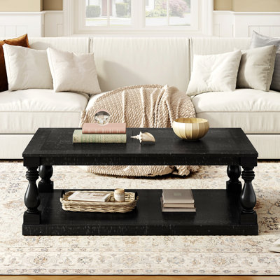 Table basse rétro avec pieds artistiques et finition luxueuse pour les salons et les bureaux