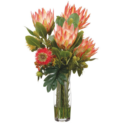 Protea/Leucospermum dans un vase en verre