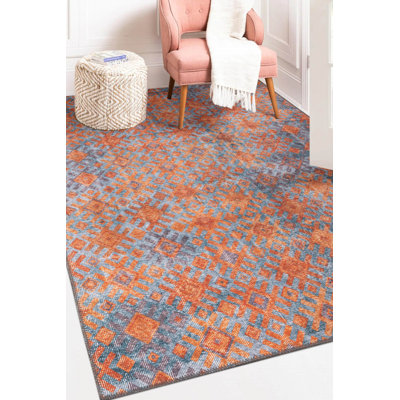 Tapis décoratif à motif géométrique orange et bleu