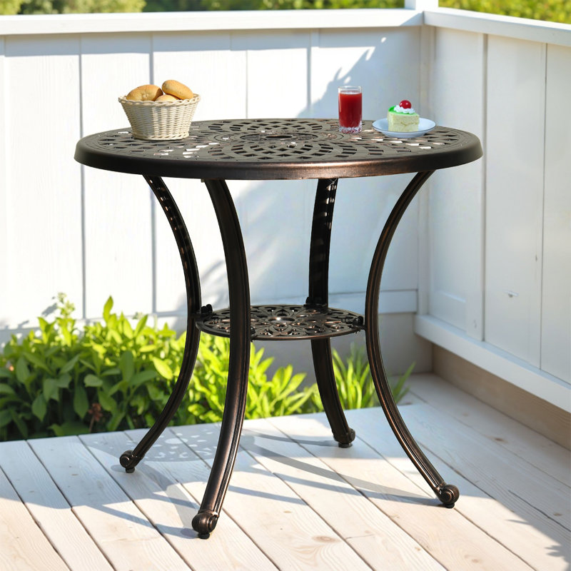 Table de salle à manger extérieure en métal avec trou pour parasol Chinwike