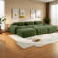 Canapé ergonomique vert olive, conception modulaire en velours côtelé avec repose-pieds