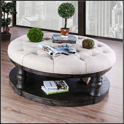 Table basse ronde en bois de style rustique avec finition gris antique, pieds tournés et tablette ouverte pour le rangement