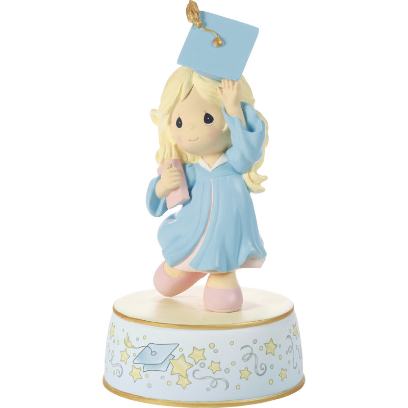 Precious Moments From Cap And Gown To New Horizons Blonde Girl in Blue Gown Graduation Musical