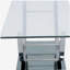 Table basse chromée à dessus en verre en forme de U