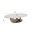 Table basse en marbre avec base sculpturale en acier inoxydable
