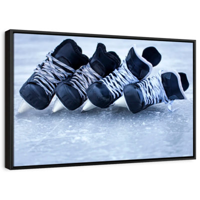 Hockey Skates On Ice Canvas Print