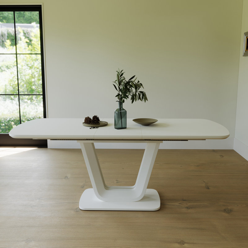 Table de salle à manger moderne extensible en bois aggloméré avec pieds en forme de U, durable et élégante