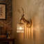 Lampe murale en laiton et cristal