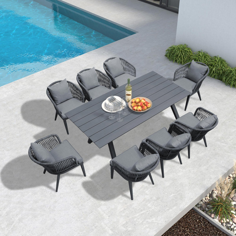 Barrus 8 - Person Patio Dining Set with Rectangular Table , Cushions Included