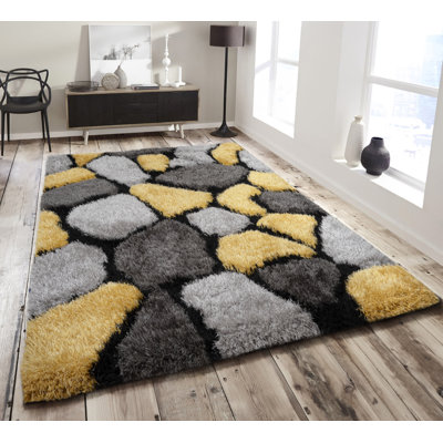 Hosston Geometric Hand Woven Shag Area Rug