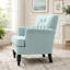 Fauteuil club capitonné en tissu avec garniture cloutée et pieds en bois de bouleau