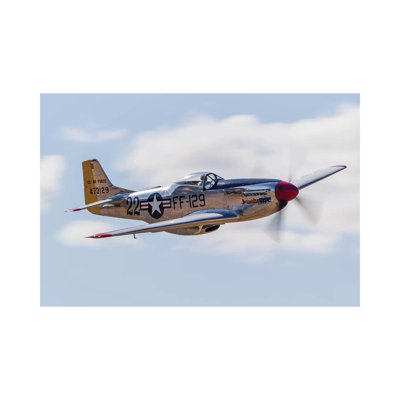 A P-51 Mustang Flies By At Vacaville, California by Rob Edgcumbe - Wrapped Canvas Print
