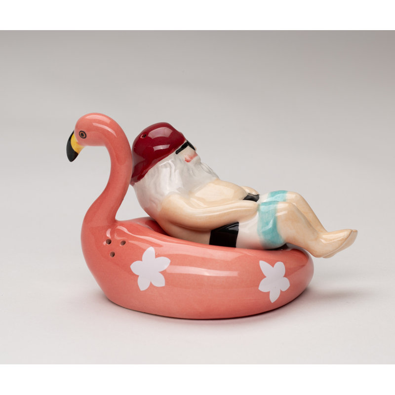 Santa Relaxing On Flamingo Salt And Pepper