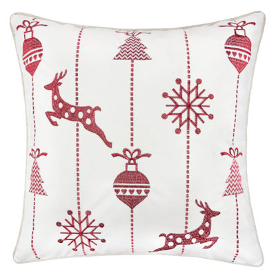 Coussin blanc de Noël avec renne brodé rouge et flocons de neige