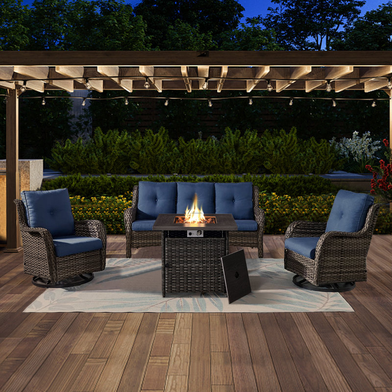 Schutt Outdoor 5 Person Rattan Sofa Seating Group with Patio Rocking & Swivel Chairs, Fire Pit and Cushions, Blue