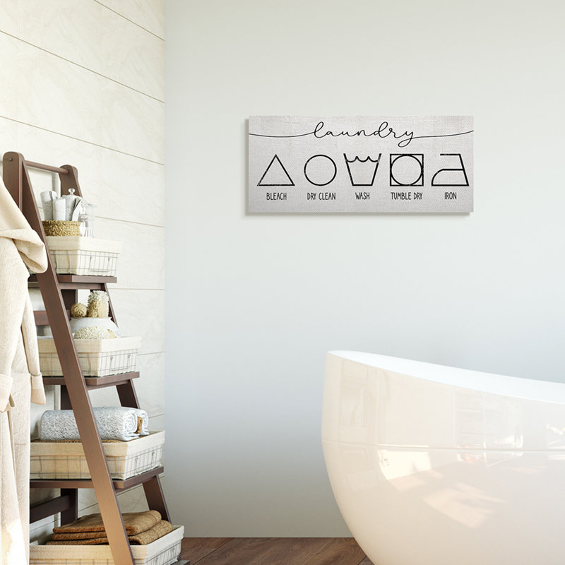 " Simple Laundry Symbol Guide Clean Home " by Daphne Polselli, 10" H x 24" W, Wrapped Canvas