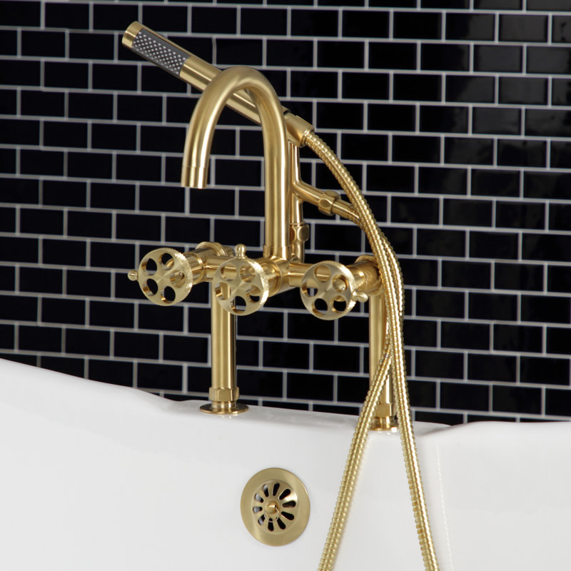 Kingston Brass Webb Three-Handle 2-Hole Deck Mount Clawfoot Tub Faucet with Knurled Handle and Hand Shower, Brushed Brass