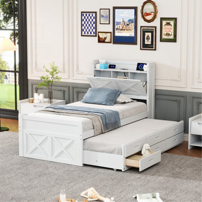 Lit simple en bois avec tête de lit avec prises de courant, lit extensible avec lit gigogne simple avec trois tiroirs de rangement, blanc