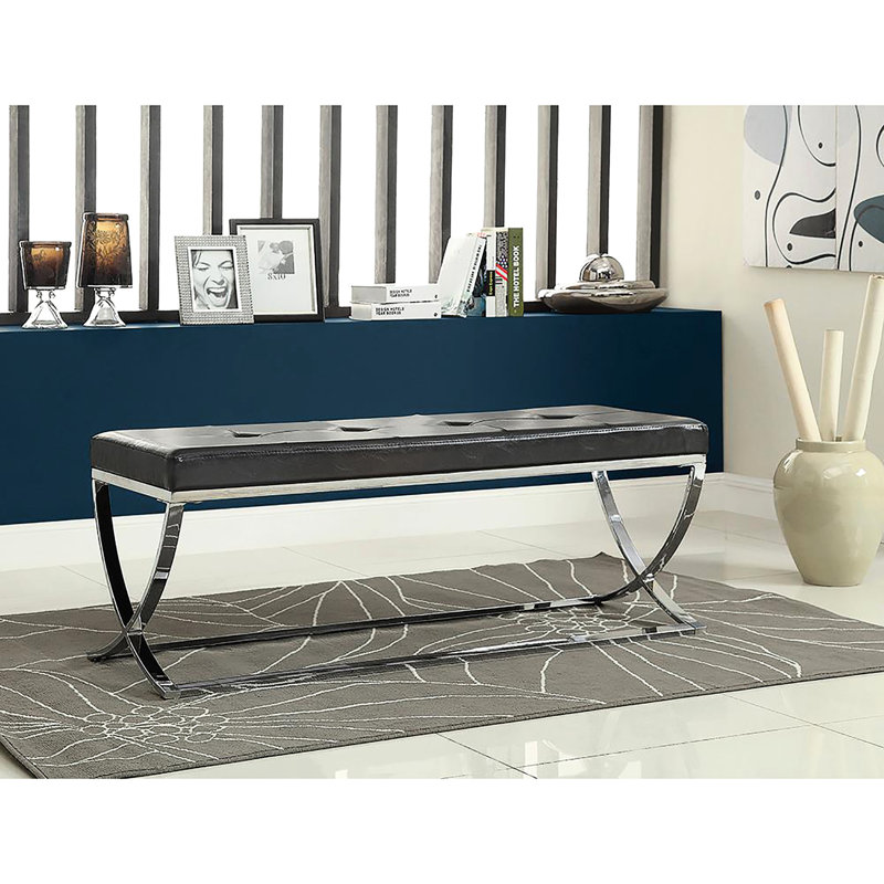Banc contemporain noir avec cadre orné et pieds courbés modernes rembourrés