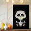 Toile, un joli panda de style dessin animé avec de la fourrure noire et blanche moelleuse est assis dans un environnement sombre tenant une tasse brillante pour l'art mural moderne sur toile-175495529