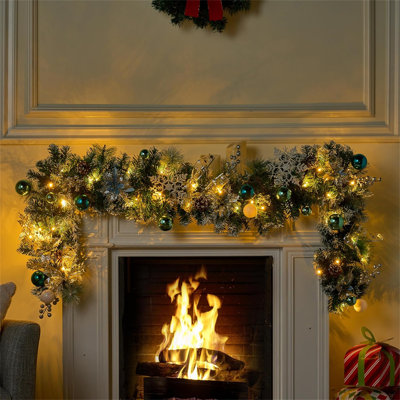 Pre-Lit 6ft Christmas Garland with Ball Ornaments, Snowflake, Flowers, Silver Leaves, Bows and 50 LED Lights for Indoor Outdoor Xmas Holiday Decor, Battery Operated