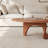 Modern Walnut Oval Coffee Table with Sculptural Arch Base