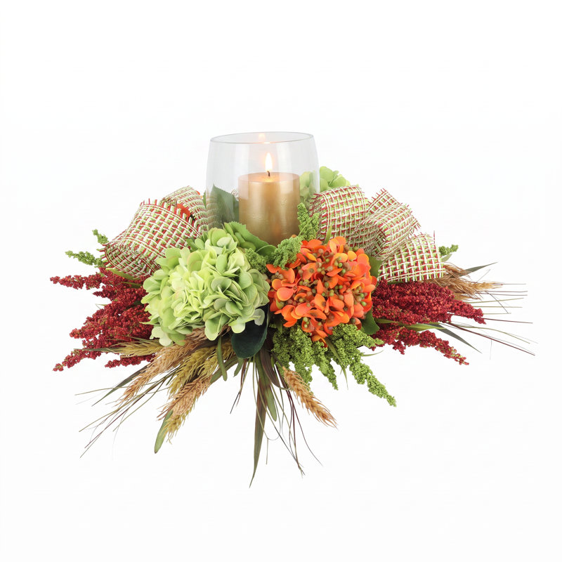 Centre de table d'automne avec hortensias, blé et pommes de pin d'automne