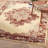 Burnie Oriental Cream/Red Area Rug-1539494054