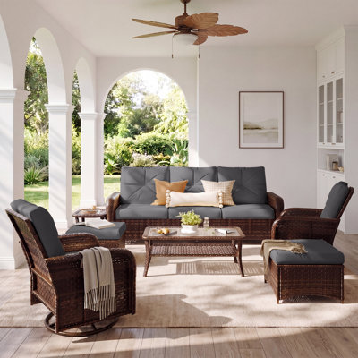 Ensemble de conversation d'extérieur en osier 7 pièces avec chaises pivotantes et repose-pieds, ensemble de mobilier de patio avec coussins, table basse et table d'appoint