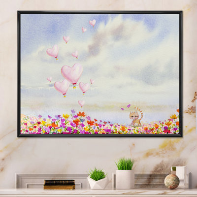 Adorable chat jouant avec un cœur rose - impression sur toile flottante