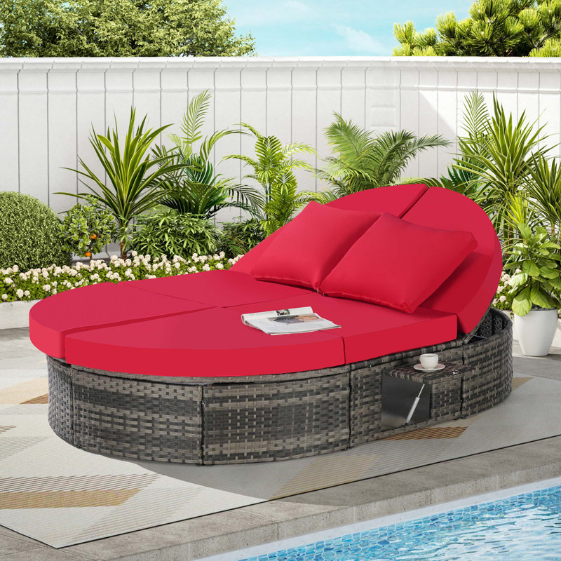 Outdoor Patio Daybed with Adjustable Backrests, Foldable Cup Trays, Ergonomic Wave Design, and Premium Cushions for Backyard or Poolside Relaxation.