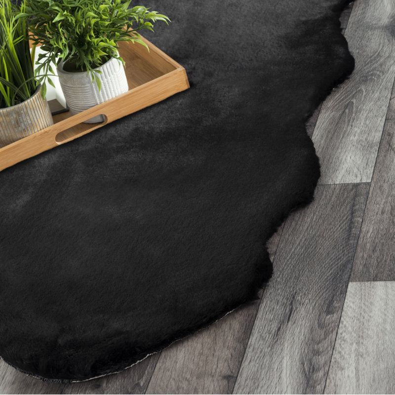 Tapis noir en fourrure de faux lapin Rader