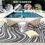 Tapis d'extérieur moderne en plastique pour pique-nique sur le balcon de la cour arrière-129685374-129913531