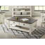 Table basse en bois massif avec rangement Holliman-497363166