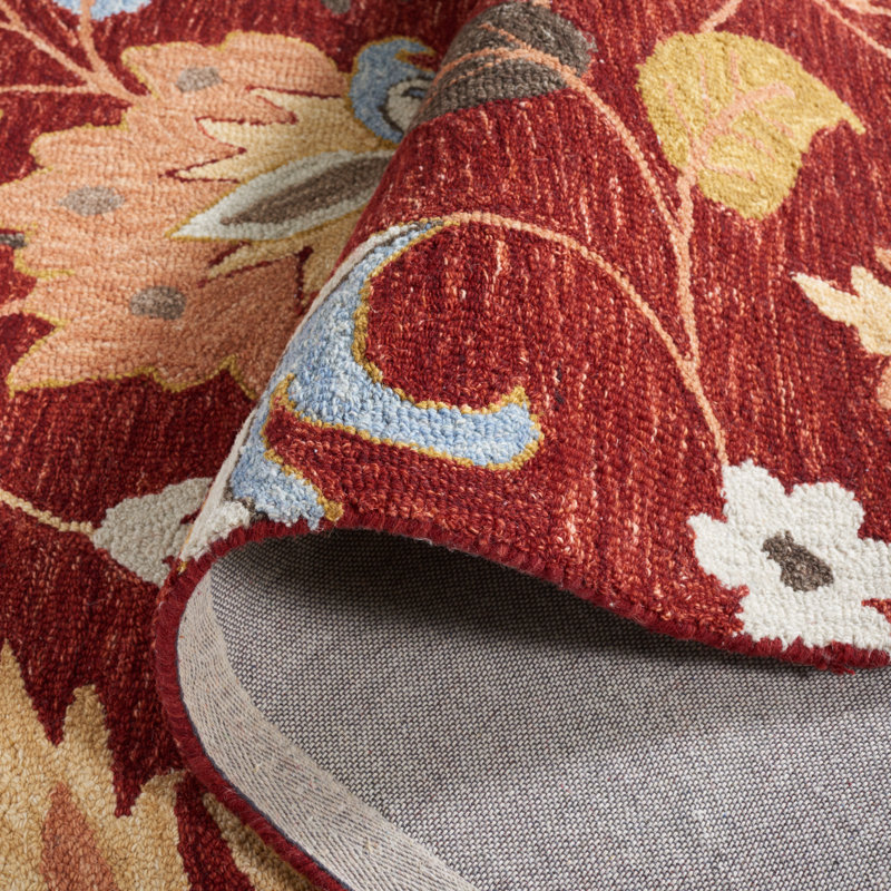 Handmade Red and Orange Floral Wool Area Rug, 5' x 8'