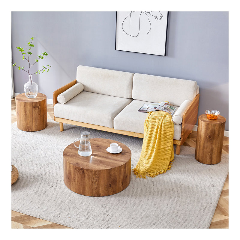 Ensemble de tables basses modernes et minimalistes de trois tables basses en bois aggloméré à motif de marbre de couleur bois. La table cylindrique avec son design à motif s'intègre facilement dans une variété de styles d'intérieur.