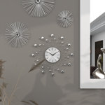 Metal Starburst Decorative Wall Clock with Crystal Accents