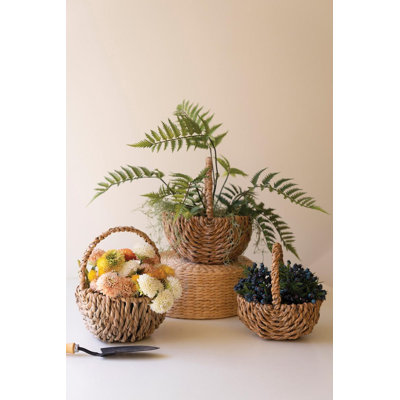 SET OF THREE WOVEN SEAGRASS BASKETS WITH HANDLES