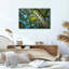 Art mural sur toile tronc d'arbre et feuilles vertes contre ciel bleu-290223983