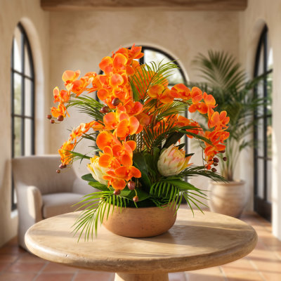 Orchid Centerpiece with Protea and Palms