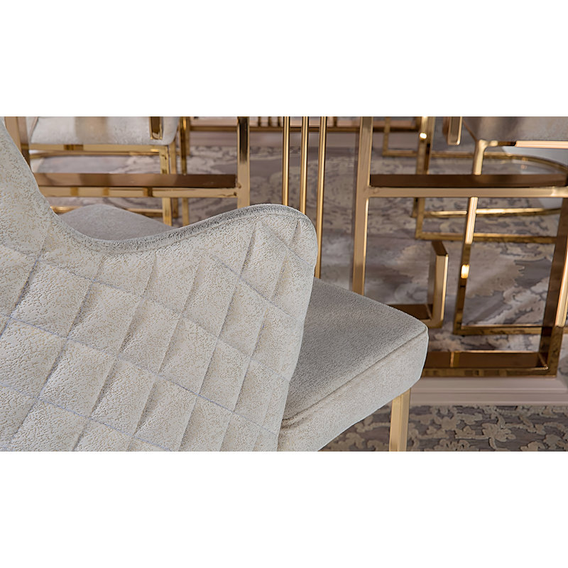 Fauteuil rembourré en tissu blanc