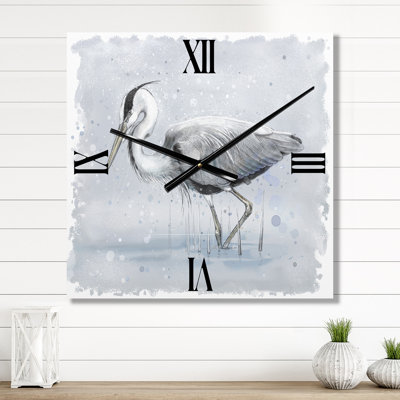 Horloge murale grise héron