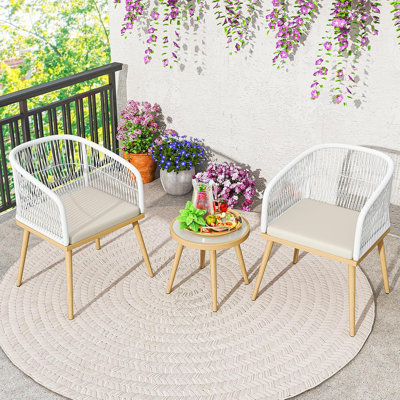 Ensemble bistro de patio 3 pièces, ensemble de conversation extérieur en osier avec coussins, table basse en verre trempé et structure en métal galvanisé, ensemble de chaises d'extérieur en rotin pour porche, balcon