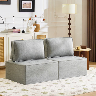 Le canapé en bois et lin gris clair peut être épissé librement, ce qui répond à divers besoins, comme dans les petits salons d'appartements et s'adapte à divers styles de décoration.