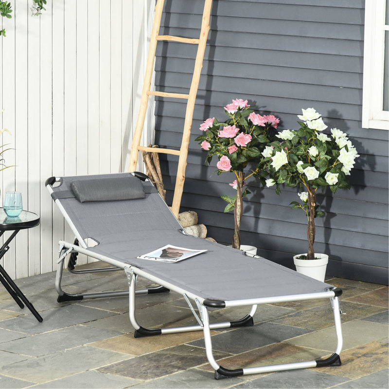 Fauteuil de plage pliable, inclinable à 5 niveaux, respirant - Fauteuil de bronzage gris près de la piscine