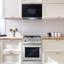 Cosmo 24 in. Stellar Collection 1.34 cu. ft. Over the Range Microwave in Stainless Steel with Vent Fan