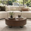Table basse ronde Ashton avec tiroir de rangement caché et base sphérique