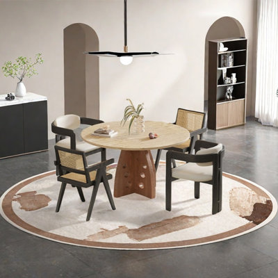 Perforated sintered stone dining table set