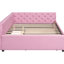 Lit double rembourré rose avec lit gigogne simple pour une chambre à coucher relaxante et pratique