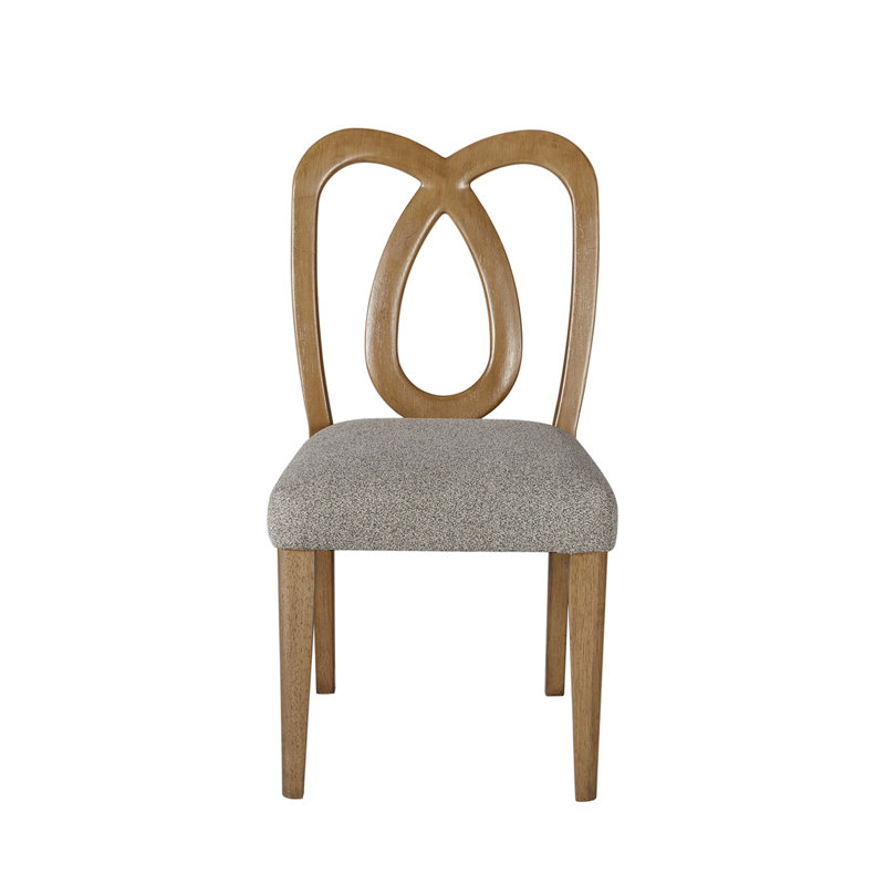 Chaise à dossier sculpté